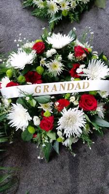 Red and White Wreath with Writing